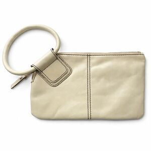 Hobo Cream Leather Wristlet Clutch | Circular Handle | Minimalist Designer Bag
